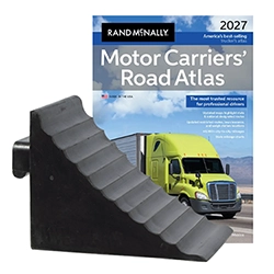 Road Atlas placed behind a rubber wheel chock