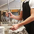 washing dishing in commerical kitchen