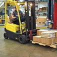 forlift operator lifting pallet