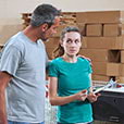 Woman uncomfortble with mans arm accross her shoulders