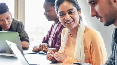 Woman viewing man's laptop