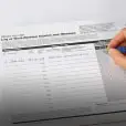 Employee filling out OSHA Form 300.