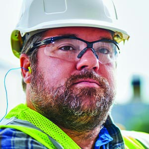 Man wearing ANSI compliant safety glasses.