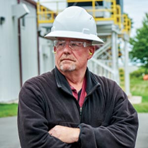 Man wearing proper head protection.