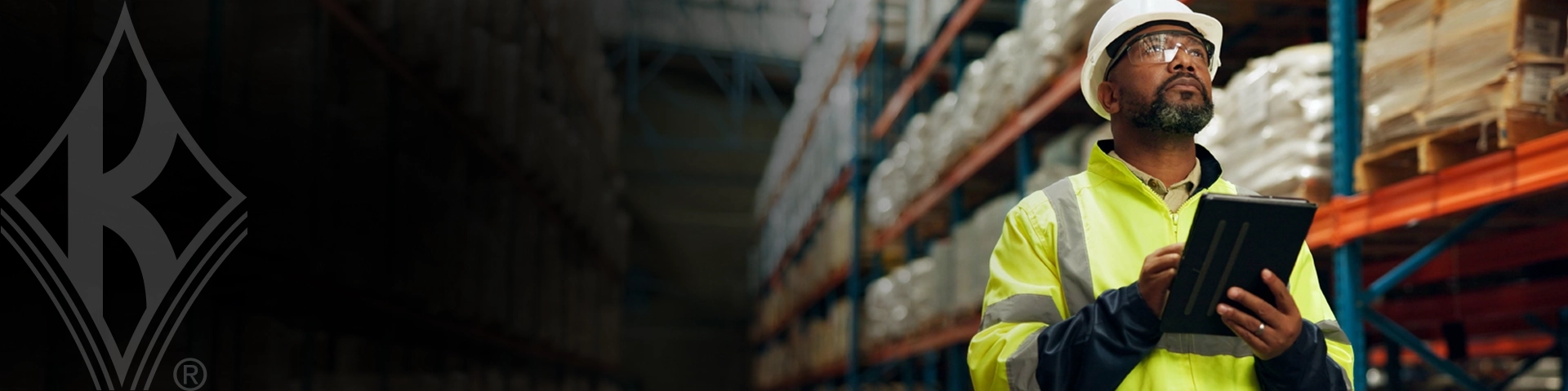 Worker in proper PPE in warehouse setting
