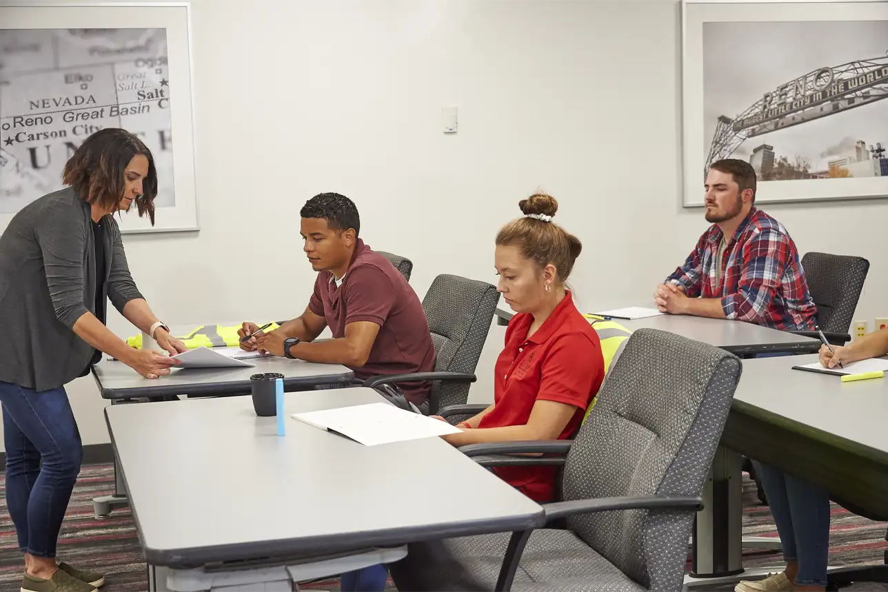Classroom presenter assisting learners